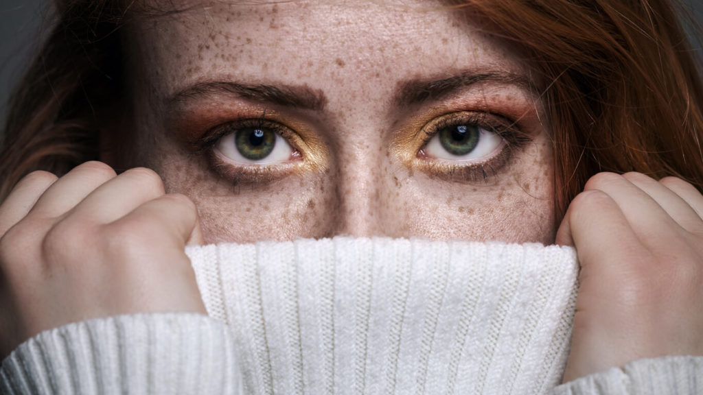 Redhead freckled woman