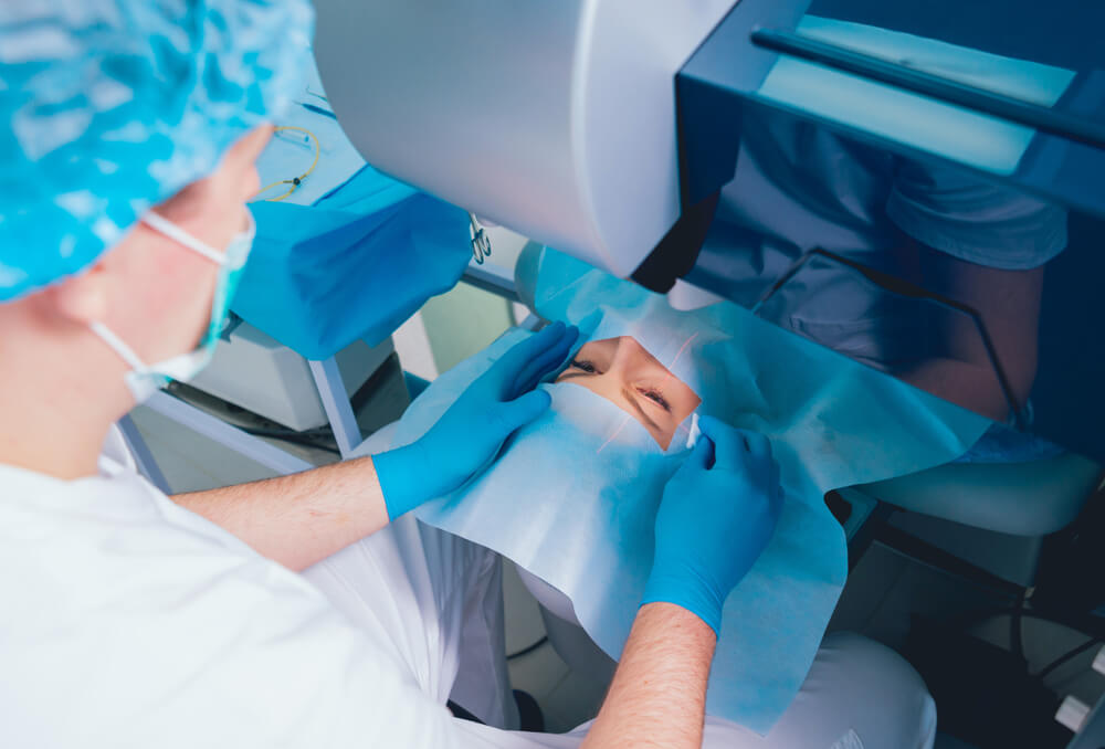 Patient and Team of Surgeons in the Operating Room During Ophthalmic Surgery | Diamond Vision