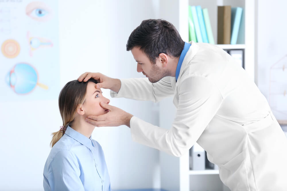 Adult Male Doctor Examining Patient | Diamond Vision