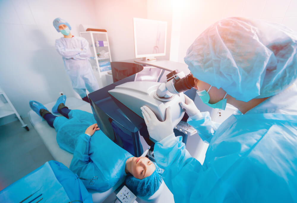 A Patient and Team of Surgeons in the Operating Room During Ophthalmic Surgery