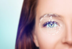 Female eye with eyechart in scanning circle, a closeup.